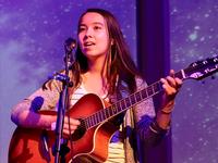 Grace on guitar